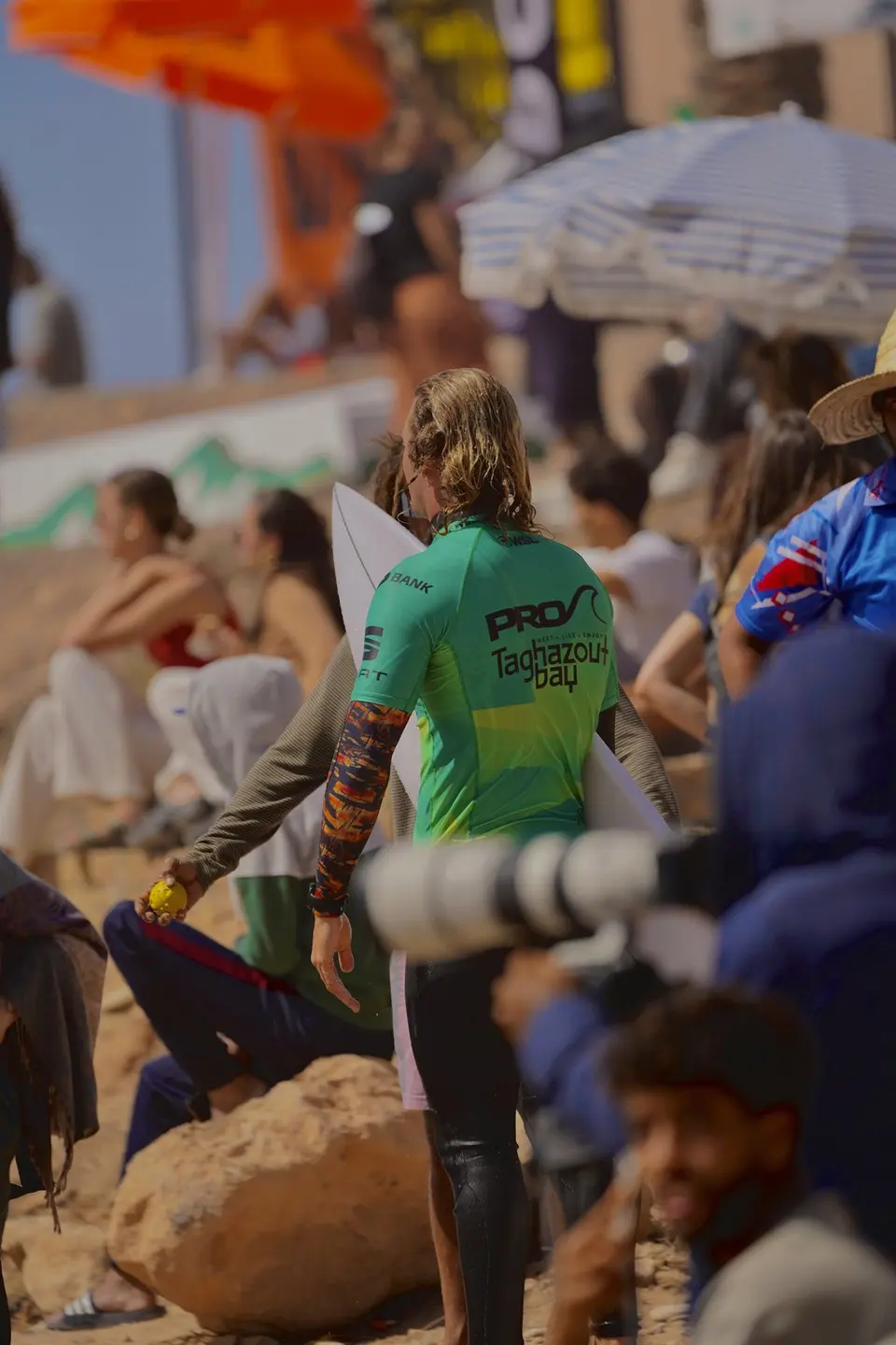 Surf camp branding content at a beach event
